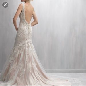 Unaltered, never used wedding dress